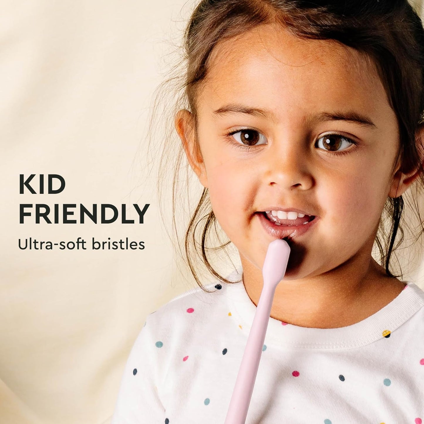Young child brushing teeth with Classic Toothbrush 4-Pack, featuring gentle ultra-soft bristles.