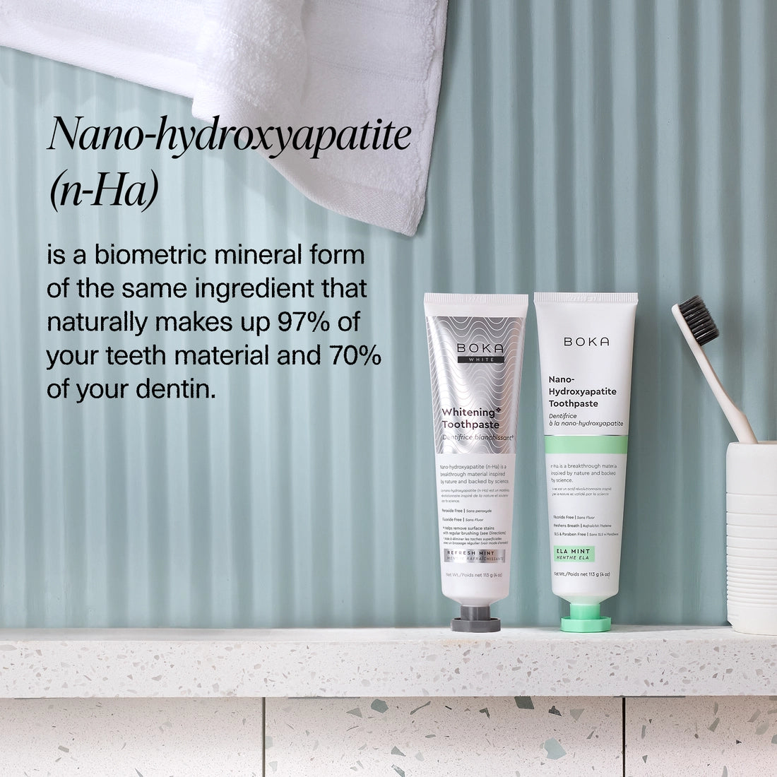 Two Boka Refresh Mint Whitening* n-Ha Toothpaste tubes and a toothbrush, peroxide-free formula.