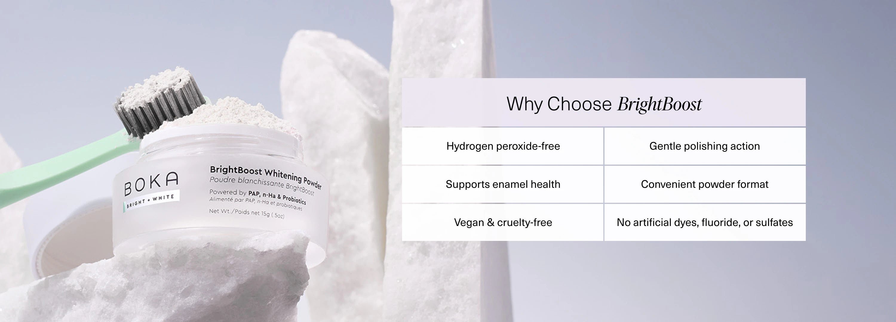 Whitening powder and toothbrush next to a list of BrightBoost benefits on a white marble background.