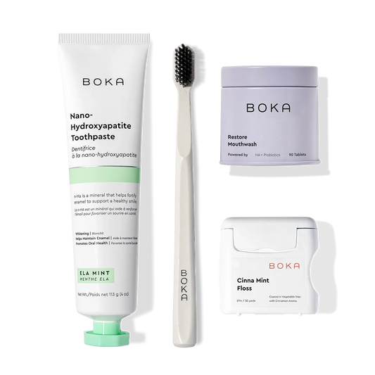 The Advanced Kit for kids includes toothpaste, toothbrush, mouthwash tablets, and floss on white.