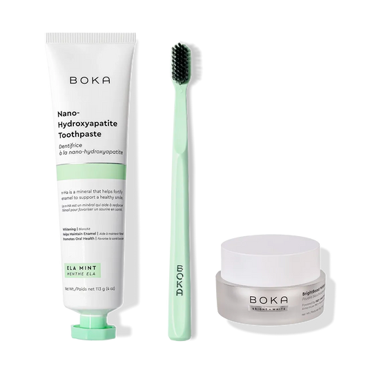 BrightBoost Whitening Kit and mint green toothbrush for a radiant smile.
