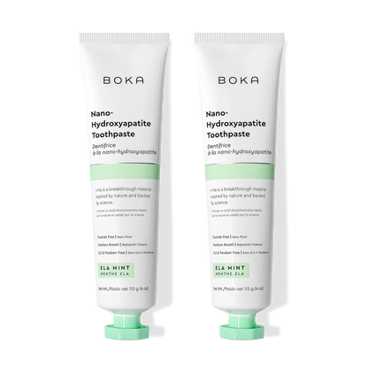 Two tubes of Ela Mint n-Ha Toothpaste for advanced biomimetic mineral oral care.