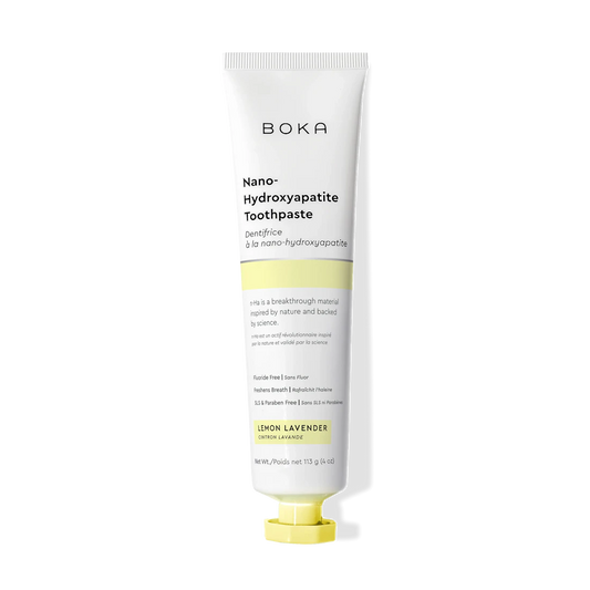 Lemon Lavender n-Ha Toothpaste tube, fluoride free, on a black background.