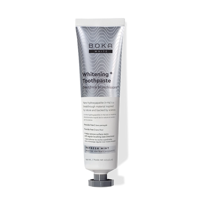 Silver tube of Refresh Mint Whitening* n-Ha Toothpaste on a white background.