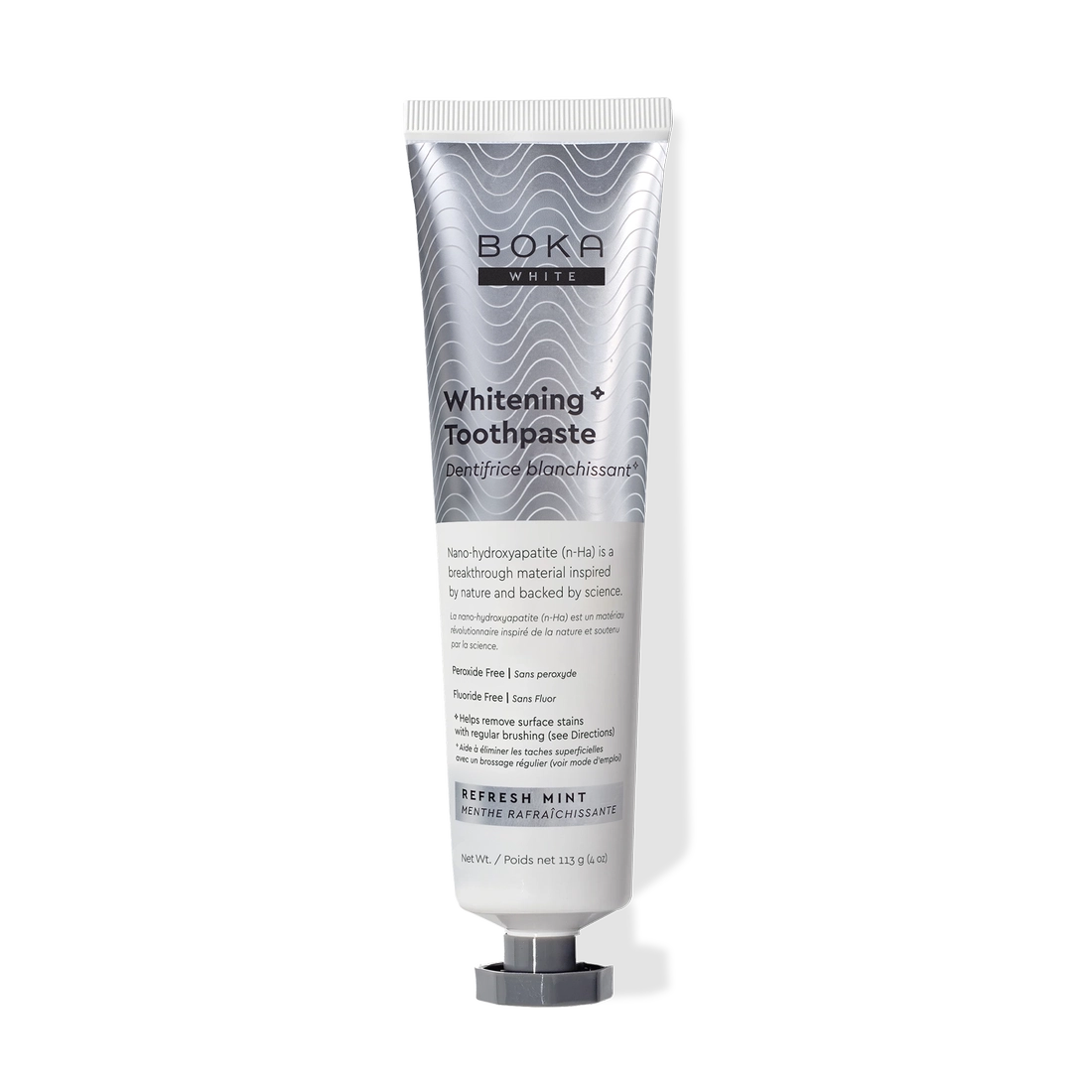 Silver tube of Refresh Mint Whitening* n-Ha Toothpaste on a white background.