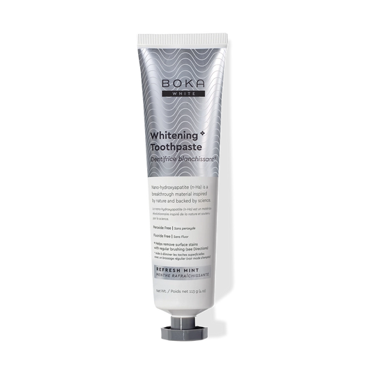 Silver tube of Refresh Mint Whitening* n-Ha Toothpaste on a white background.