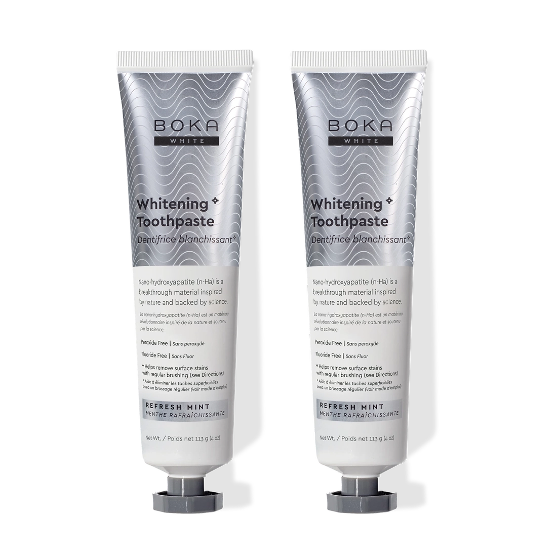 Two tubes of Refresh Mint Whitening* n-Ha Toothpaste, peroxide-free, stand side by side.