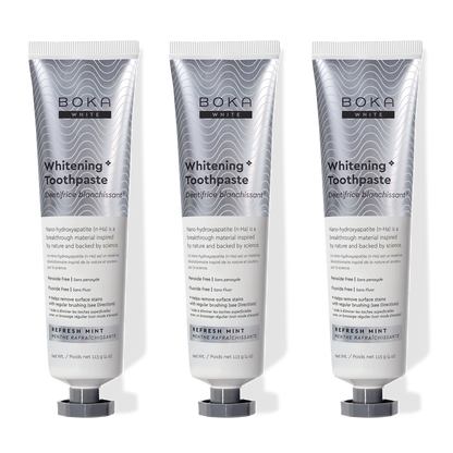 Three tubes of Refresh Mint Whitening* n-Ha Toothpaste, peroxide-free, standing upright side by side.