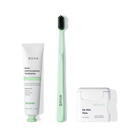 Travel Kit: includes toothpaste, mint green toothbrush with charcoal bristles, and teflon-free floss.